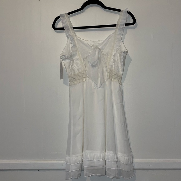 ADORABLE white sundress with tie back and ruffles - Picture 12 of 13